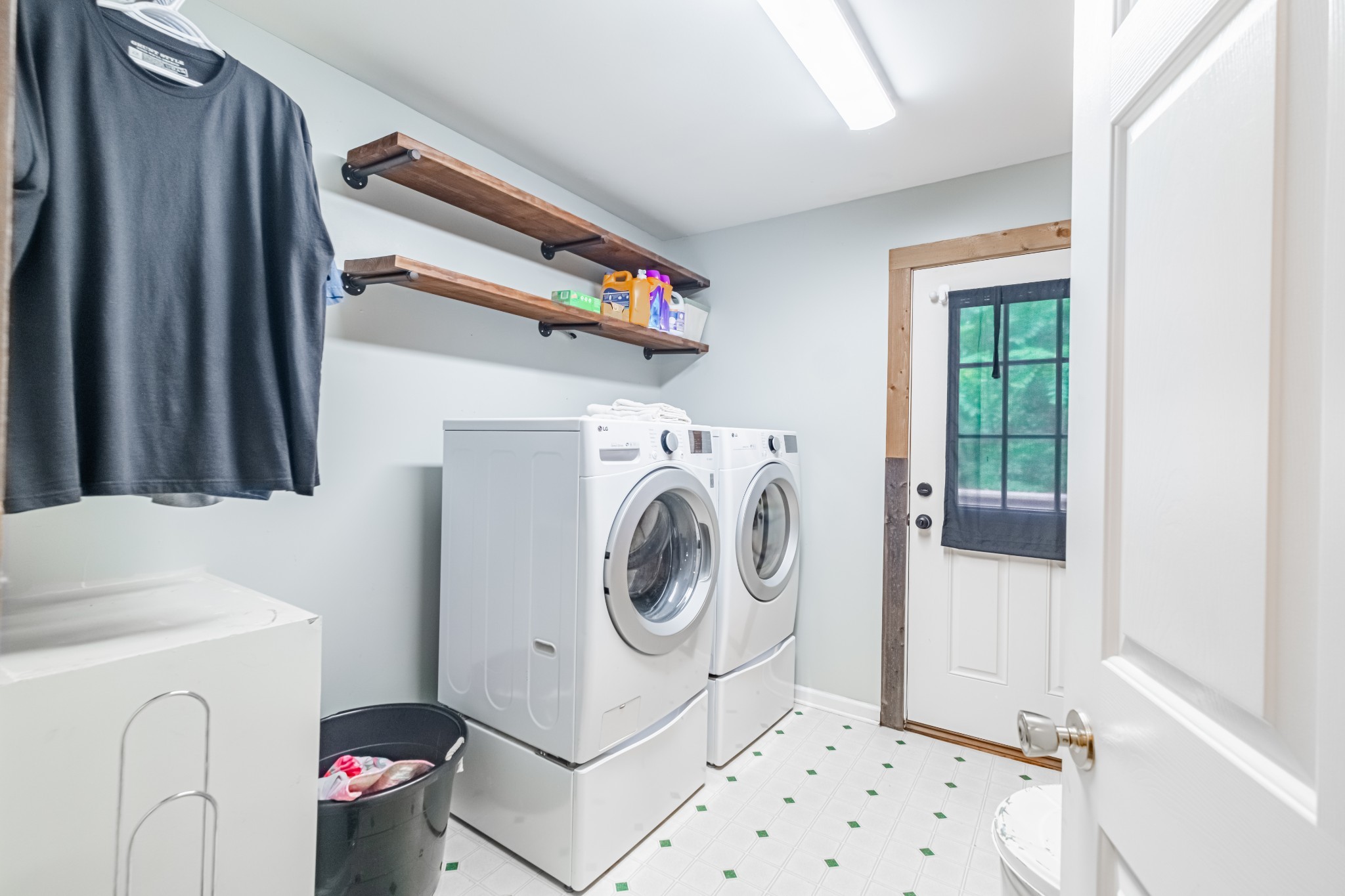 255 Flora Lane Manchester, TN 37355 - Photo 19 of 53 a utility room with dryer and washer
