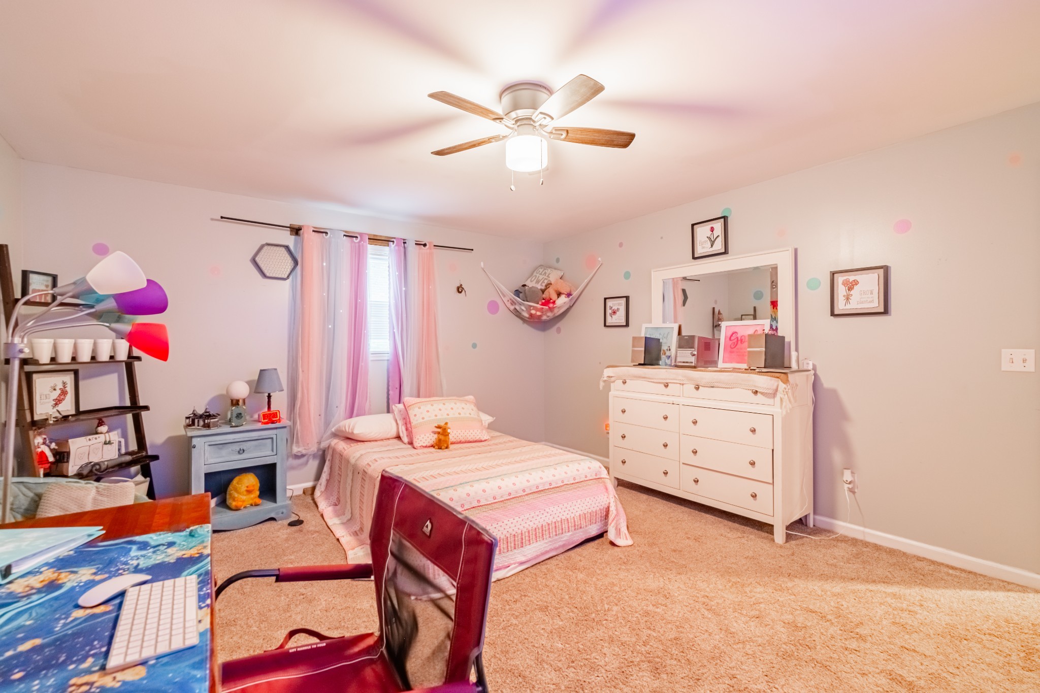 255 Flora Lane Manchester, TN 37355 - Photo 21 of 53 a bed room with a bed and a dresser