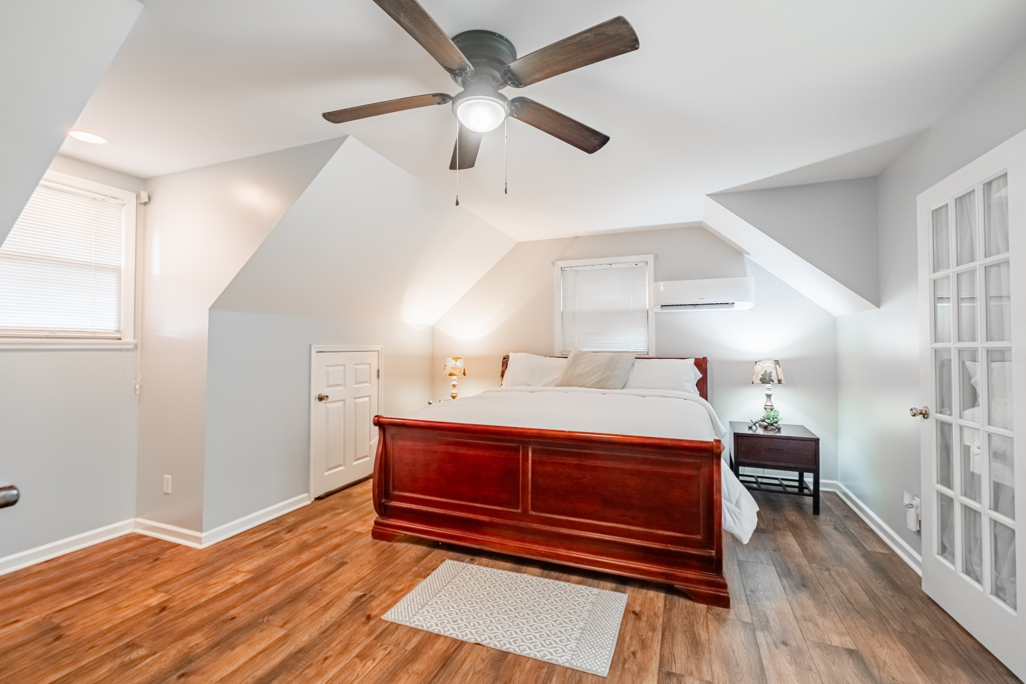 255 Flora Lane Manchester, TN 37355 - Photo 27 of 53 a room with a bed and a ceiling fan