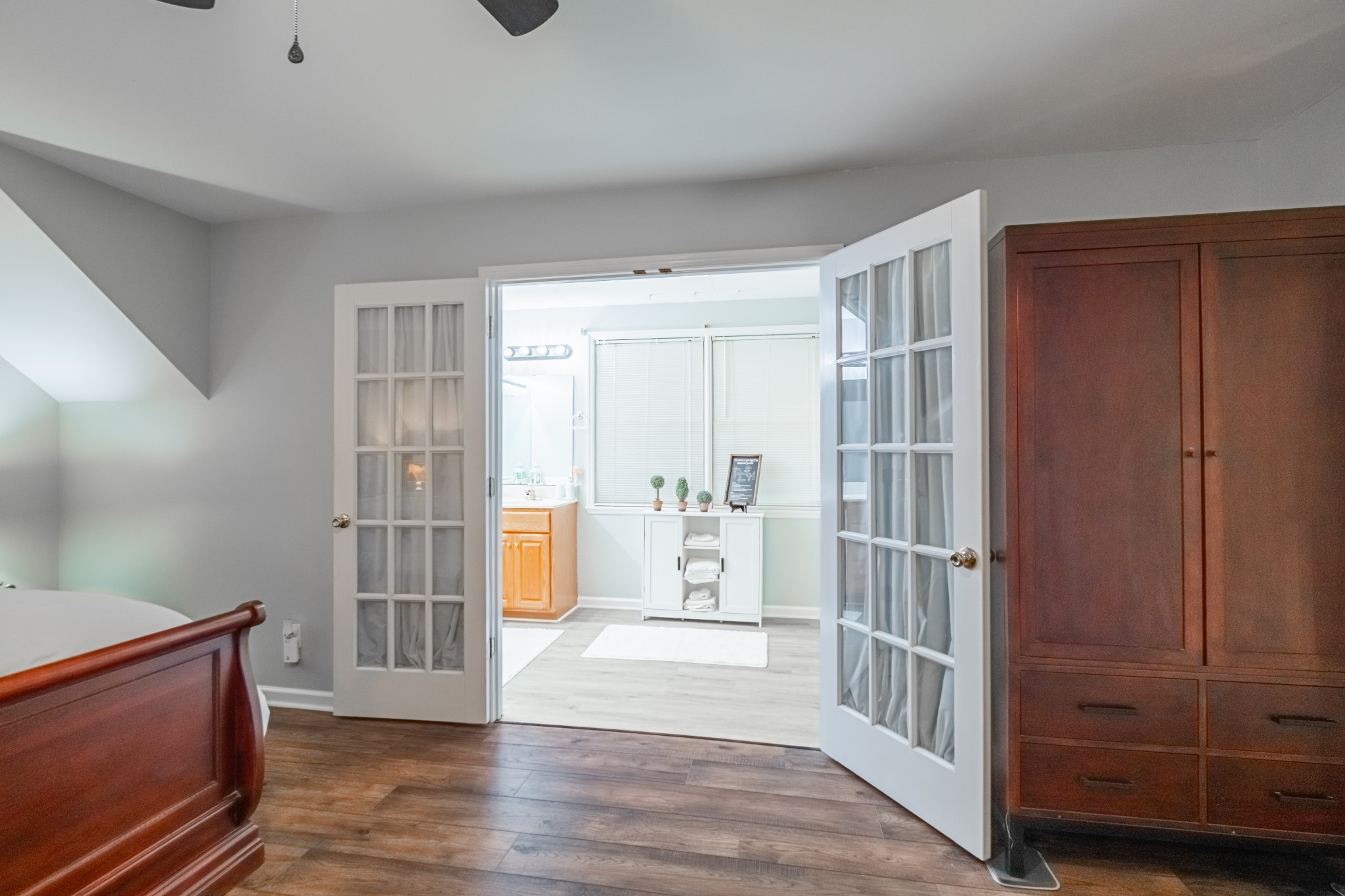 255 Flora Lane Manchester, TN 37355 - Photo 30 of 53 a view of an empty room with wooden floor and a window