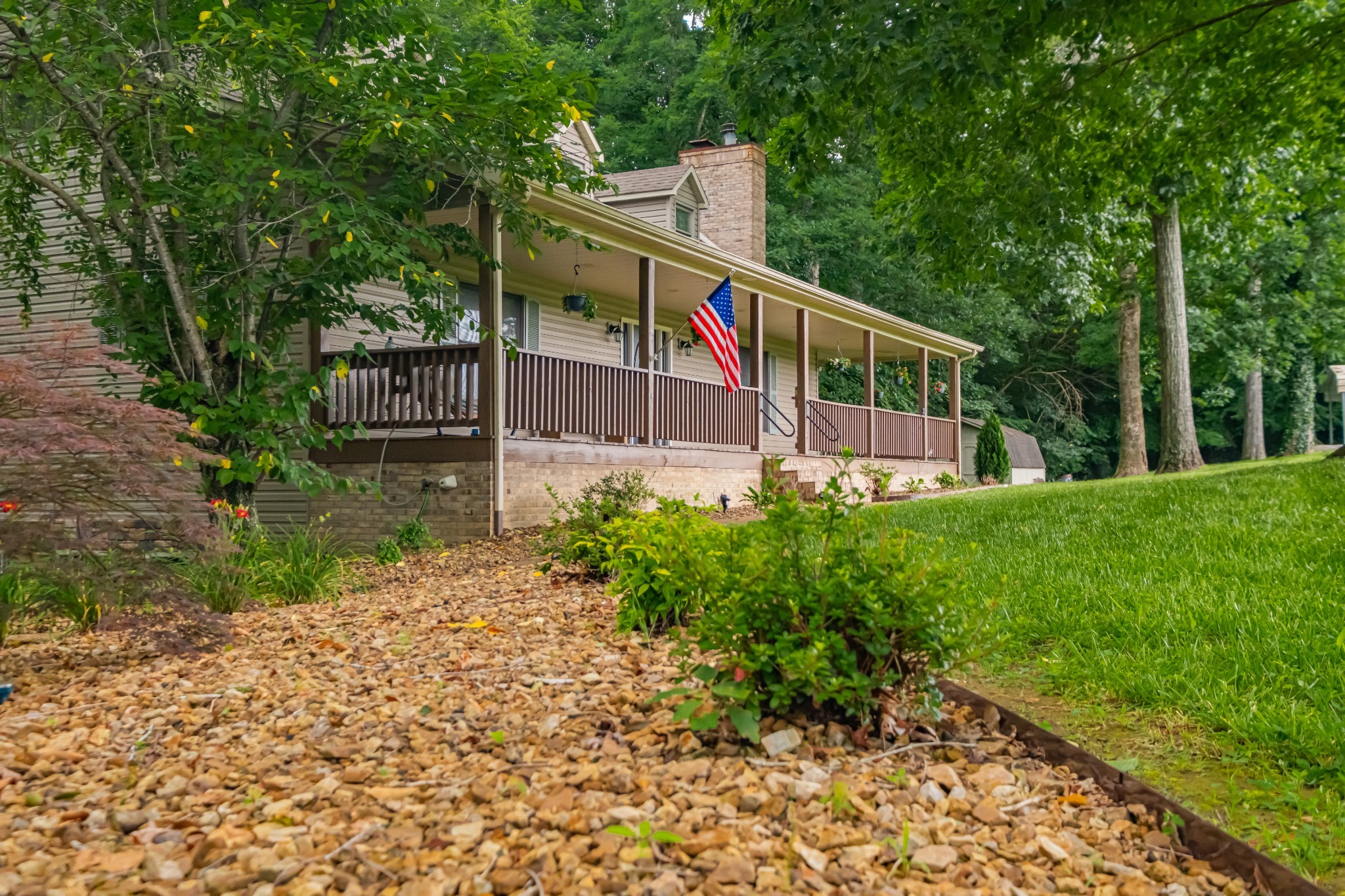 255 Flora Lane Manchester, TN 37355 - Photo 3 of 53 a view of a house with backyard and sitting area