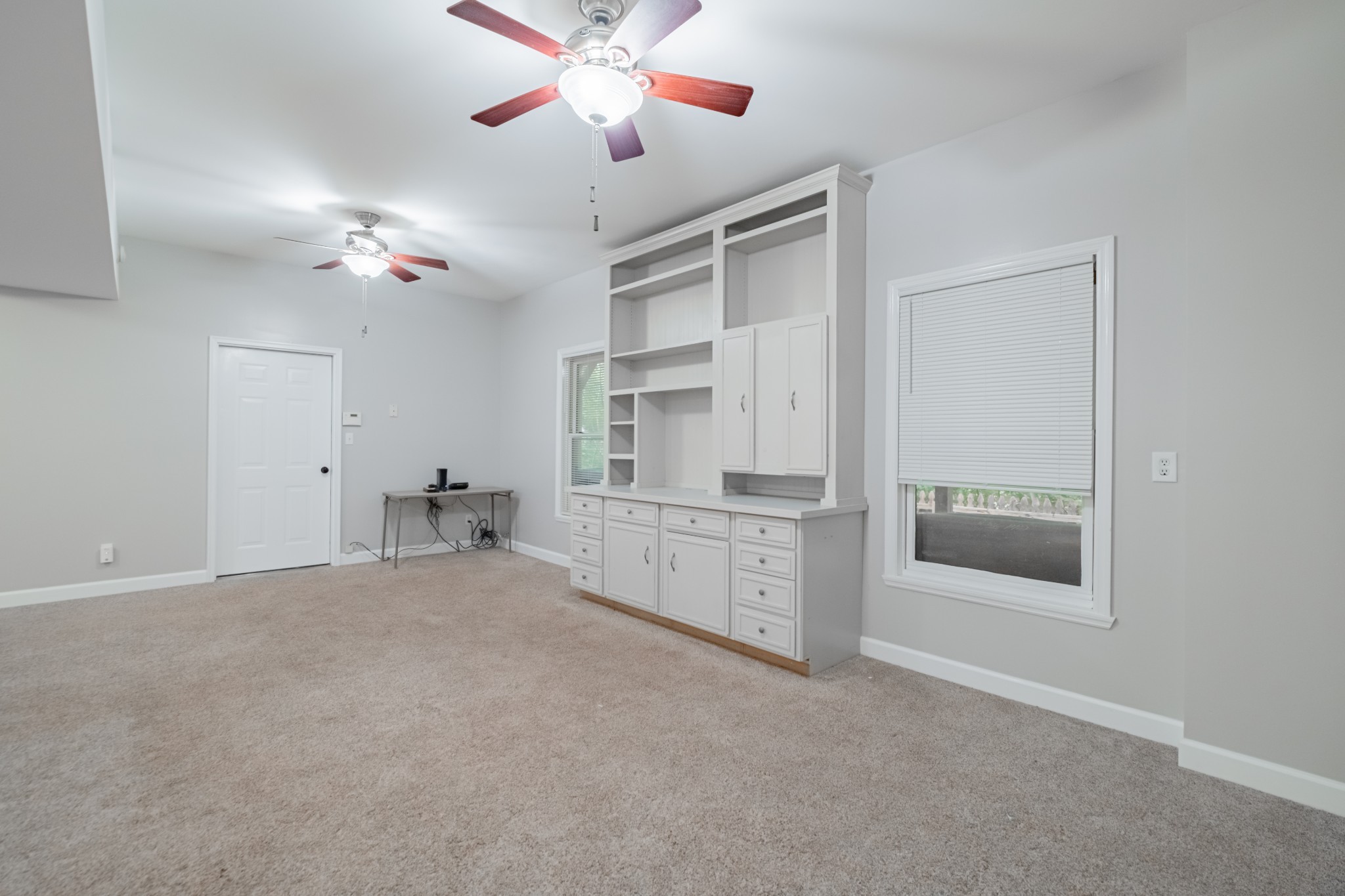 255 Flora Lane Manchester, TN 37355 - Photo 39 of 53 an empty room with windows and fan