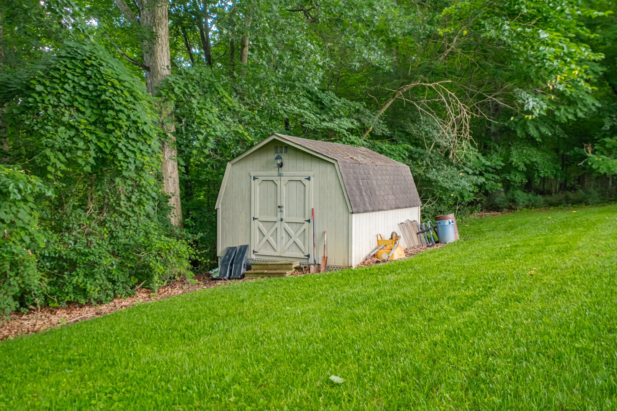 255 Flora Lane Manchester, TN 37355 - Photo 44 of 53 a wooden fence with some trees in the background