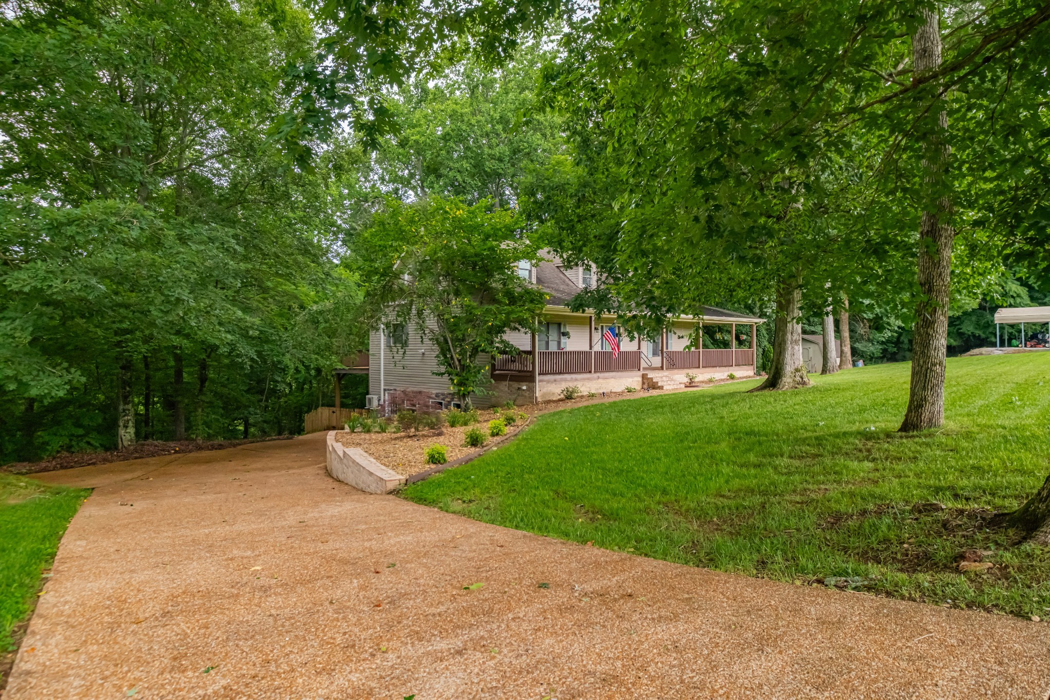 255 Flora Lane Manchester, TN 37355 - Photo 6 of 53 a view of a park with bench and trees