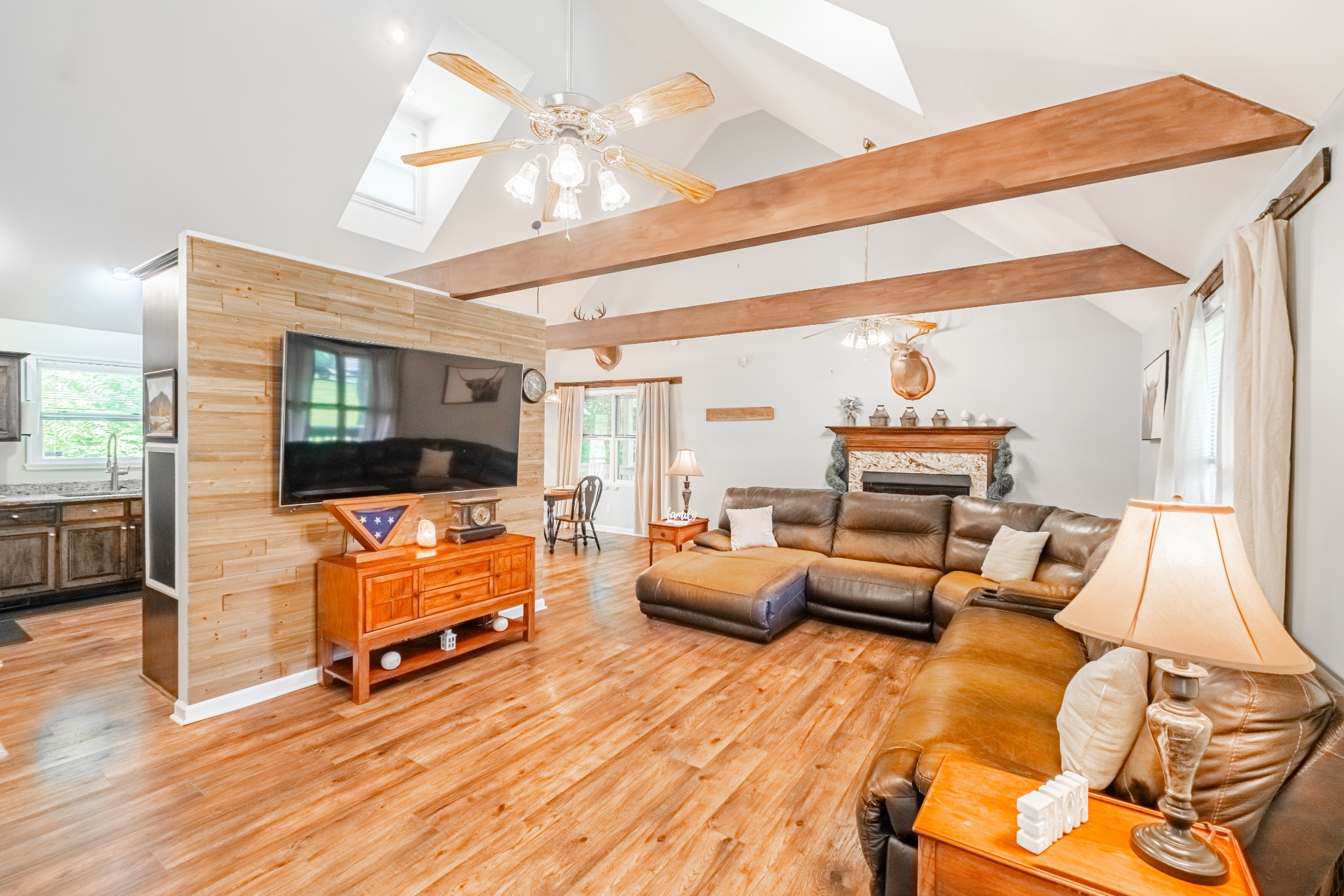 255 Flora Lane Manchester, TN 37355 - Photo 8 of 53 a living room with furniture and a flat screen tv