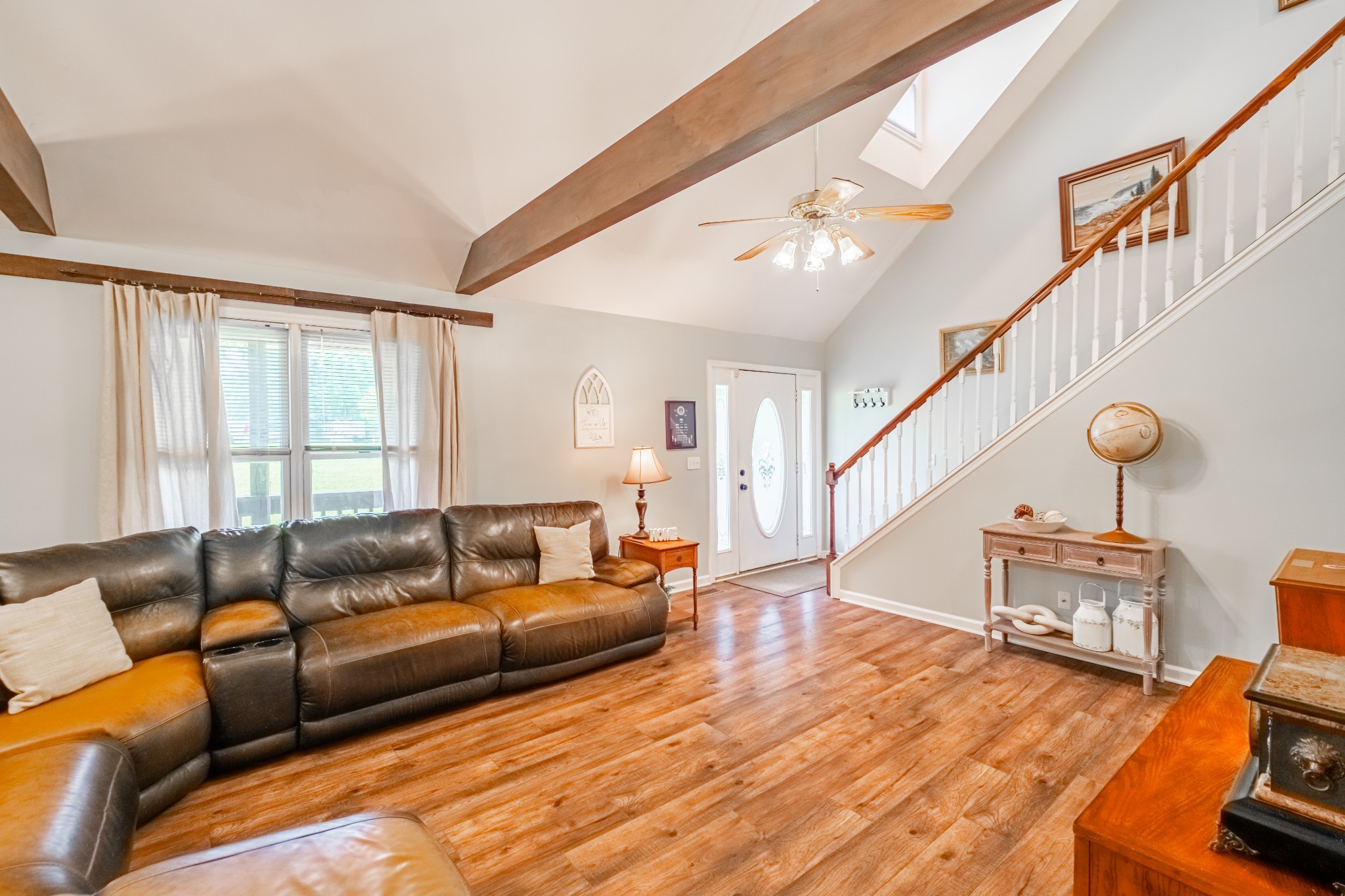 255 Flora Lane Manchester, TN 37355 - Photo 9 of 53 a living room with furniture and a wooden floor
