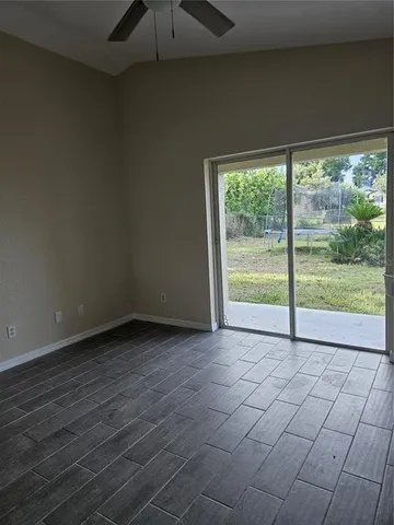 a view of a room with a large window