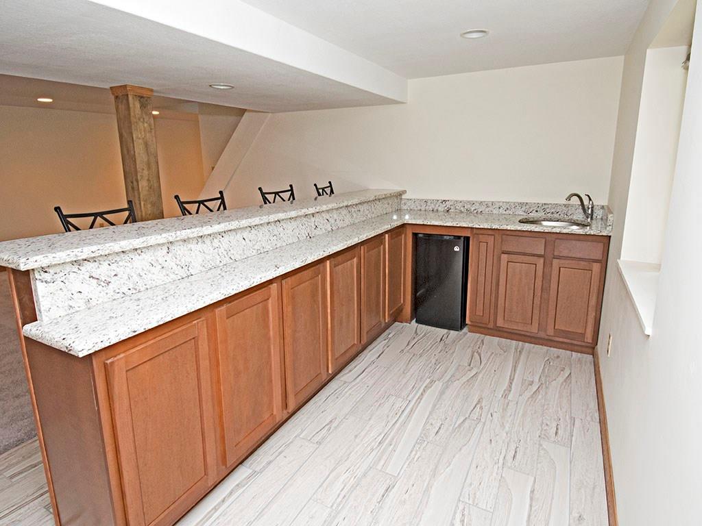 297 McKee Road Washington, PA 15301 - Photo 17 of 19 Wet bar equipped with sink and mini fridge.