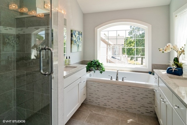 204 Fairbank Road Riverside, IL 60546 - Photo 13 of 24 a bathroom with a granite countertop tub sink and mirror