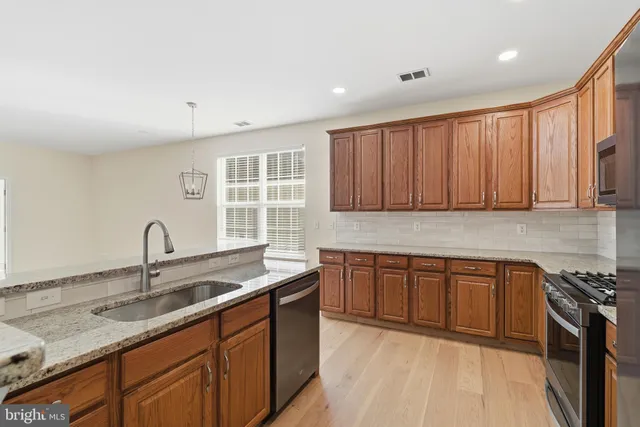 a bedroom with furniture and book shelf