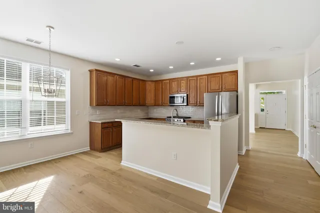 a room with furniture and a large window