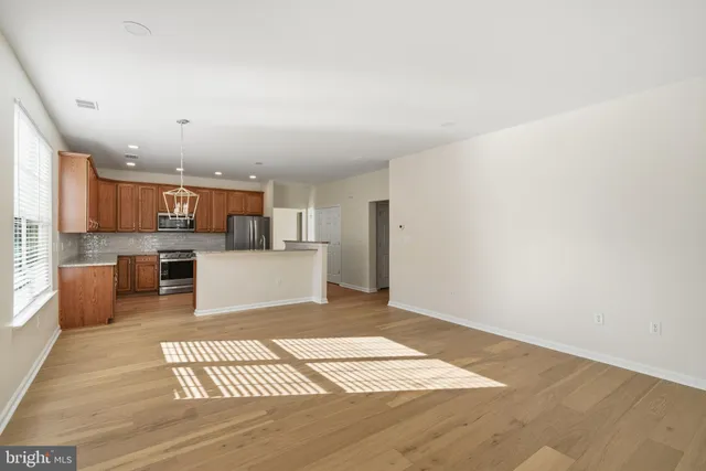 a view of an chairs and table in a balcony