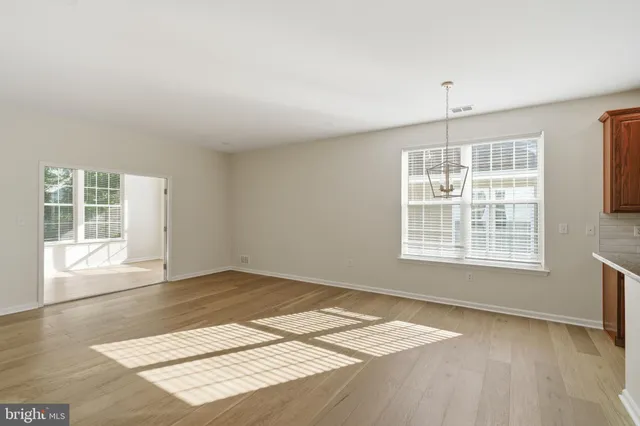 a view of a building with sitting area