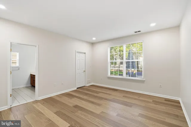 a view of a house with a yard porch and sitting area