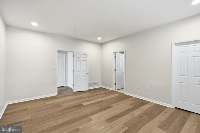 a balcony with table and chairs