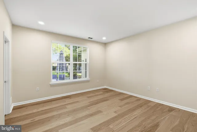 a view of a house with a yard garden and patio