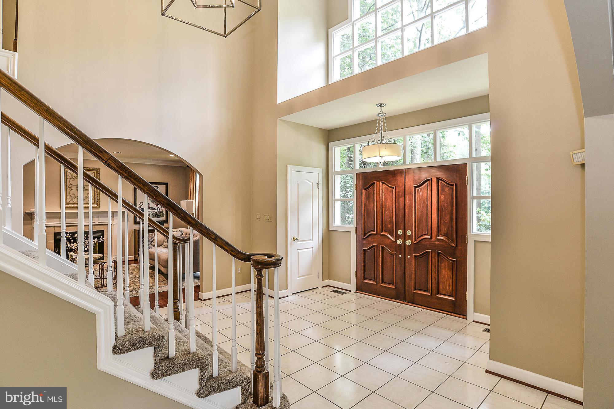1309 Stamford Way Reston, VA 20194 - Photo 2 of 50 Grand Two Story Foyer with Center Staircase