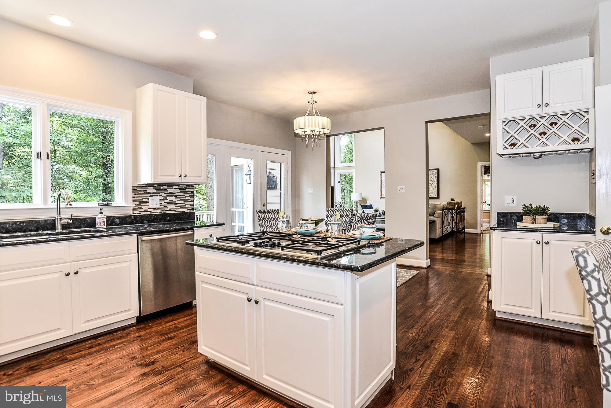 1309 Stamford Way Reston, VA 20194 - Photo 12 of 50 Center Island with Granite & Gas Range