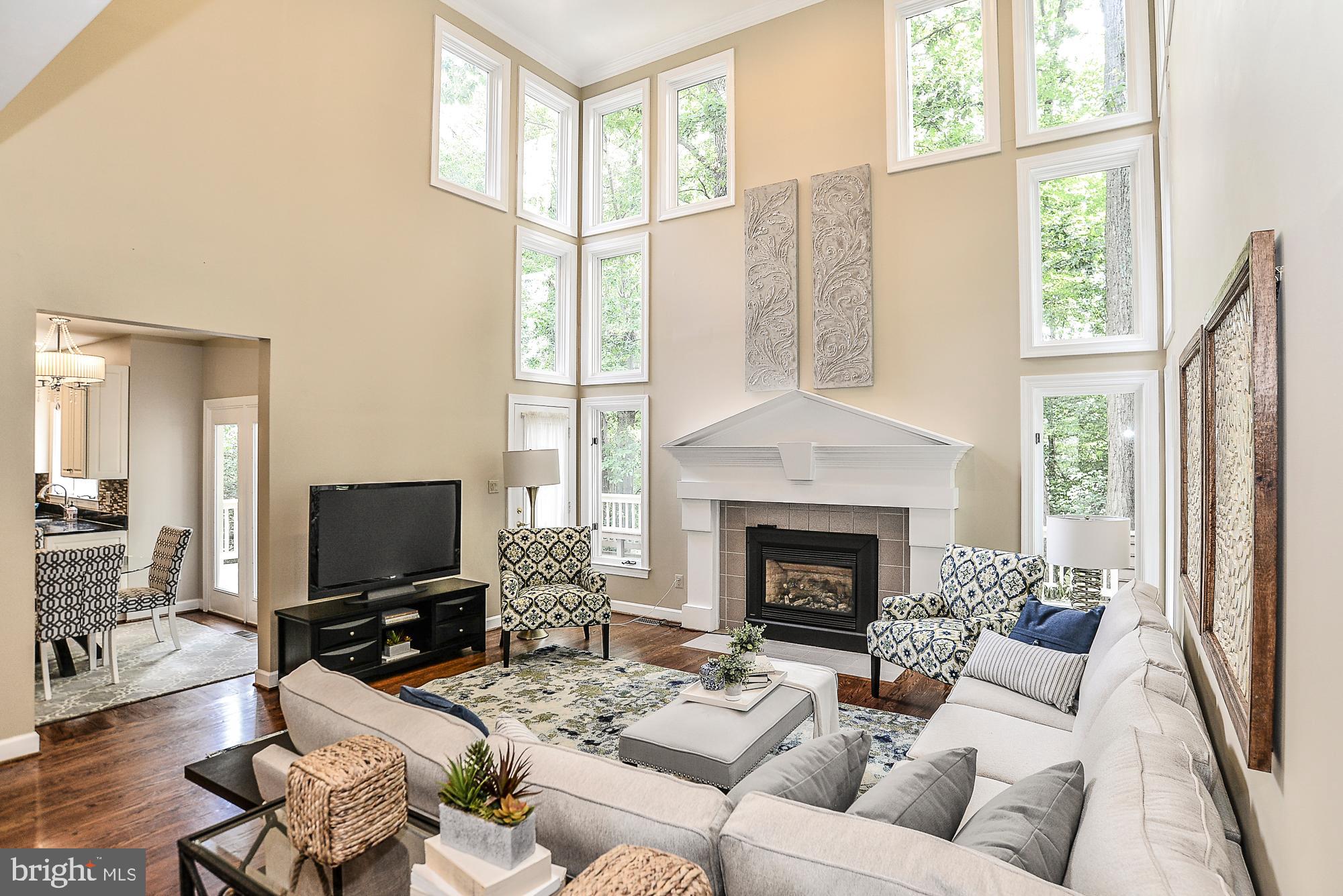 1309 Stamford Way Reston, VA 20194 - Photo 13 of 50 Sunlit 2 Story Family Room with Gas Fireplace