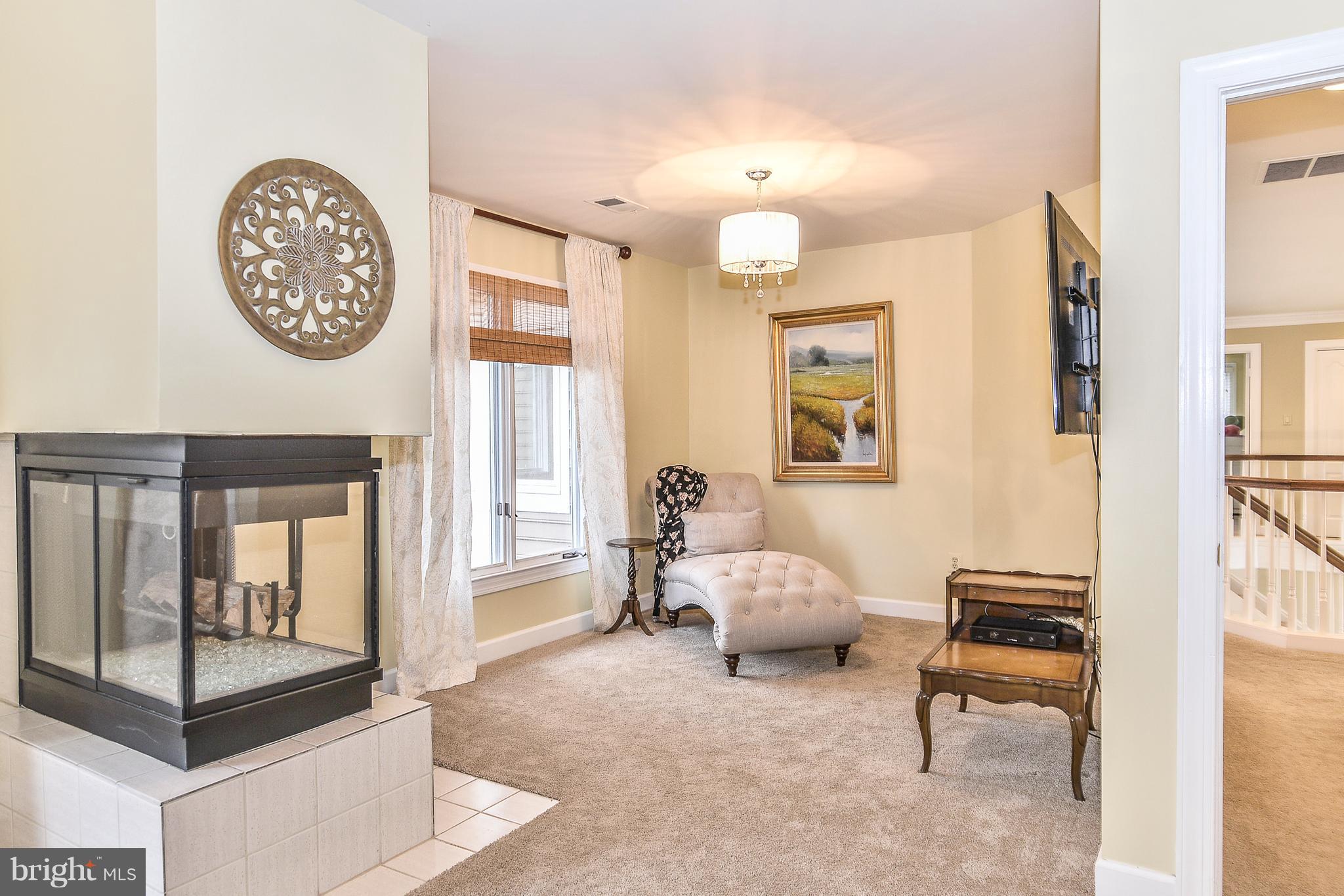 1309 Stamford Way Reston, VA 20194 - Photo 25 of 50 Sitting Room with Custom Lighting