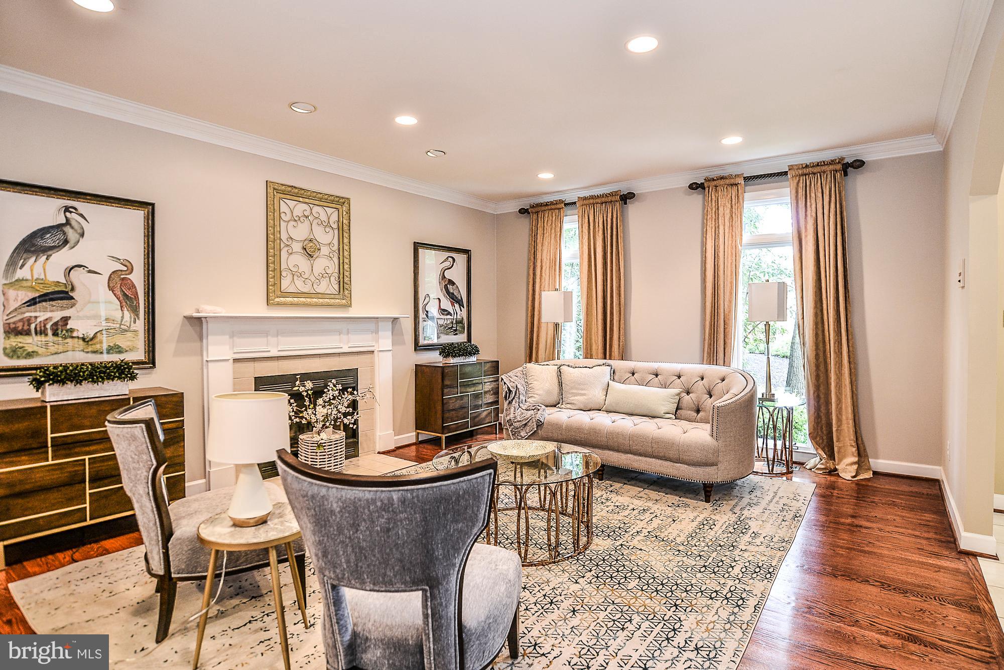 1309 Stamford Way Reston, VA 20194 - Photo 4 of 50 Sunlit Living Room with Hardwoods
