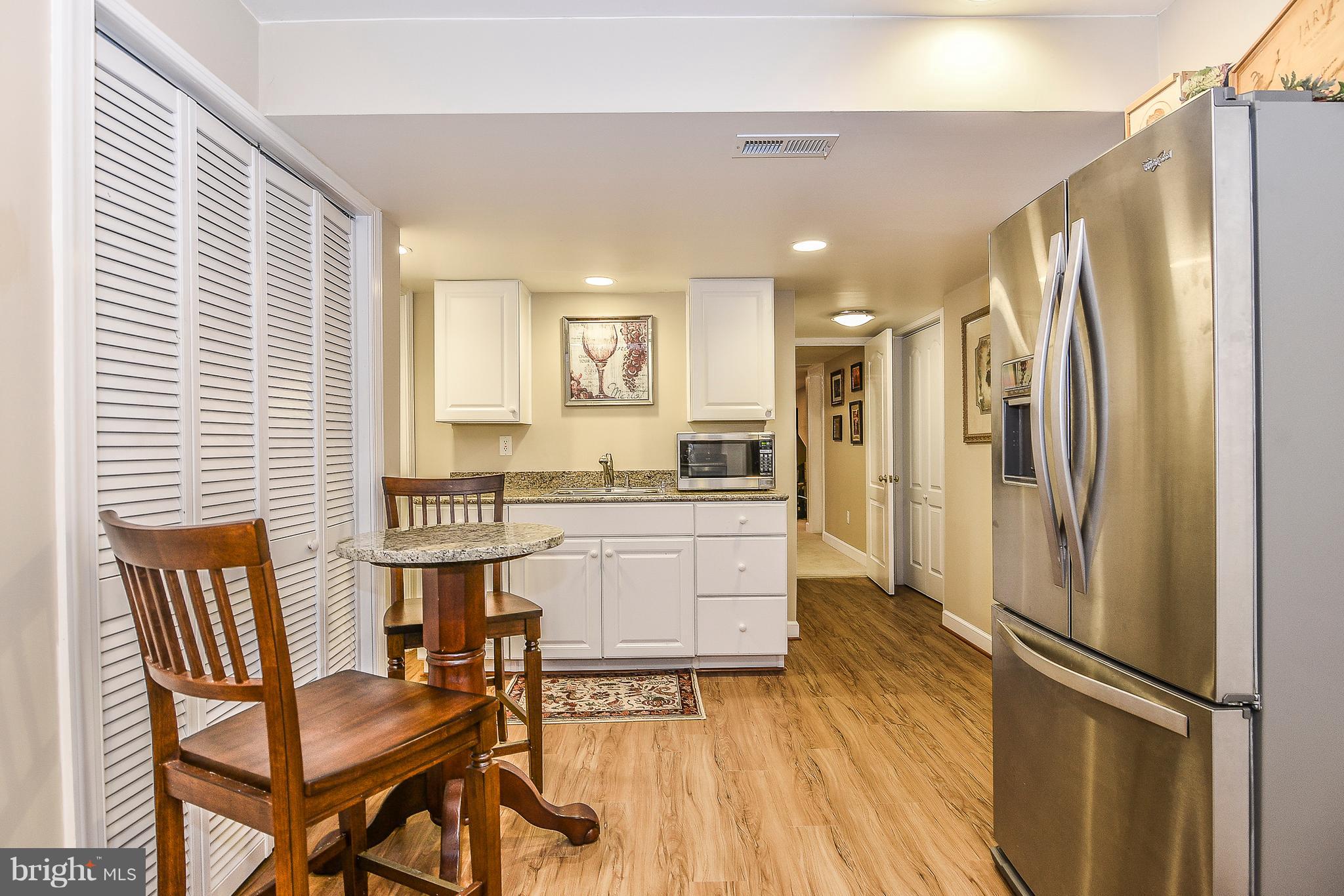 1309 Stamford Way Reston, VA 20194 - Photo 39 of 50 Min Kitchen with Granite & SS Refrigerator