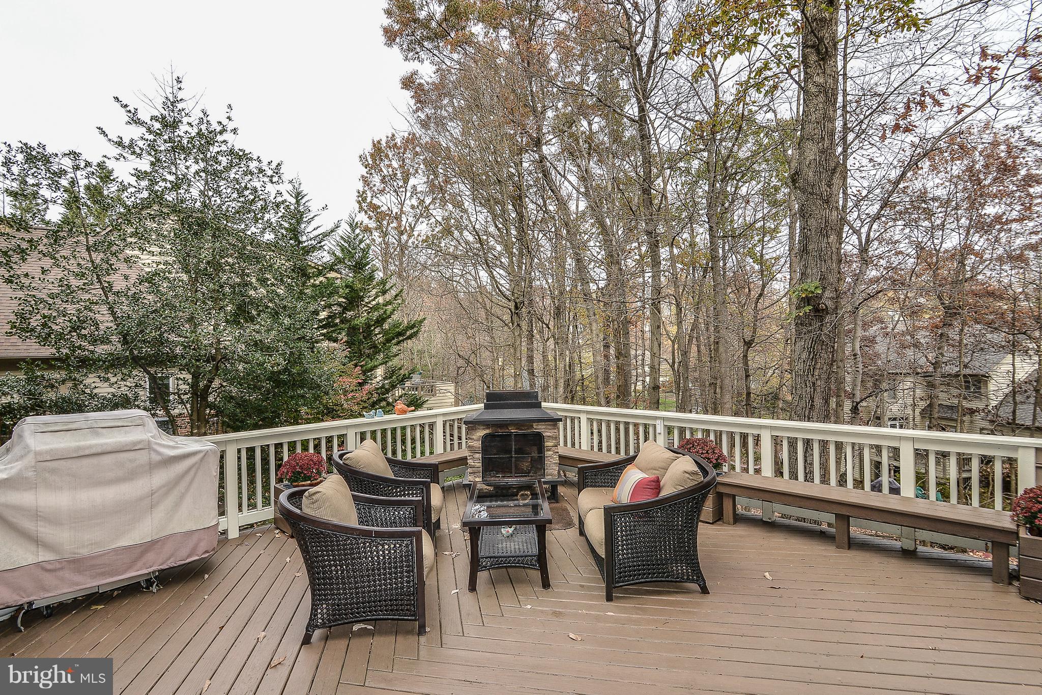 1309 Stamford Way Reston, VA 20194 - Photo 44 of 50 Private Deck with Stacked Stone Wood Fireplace