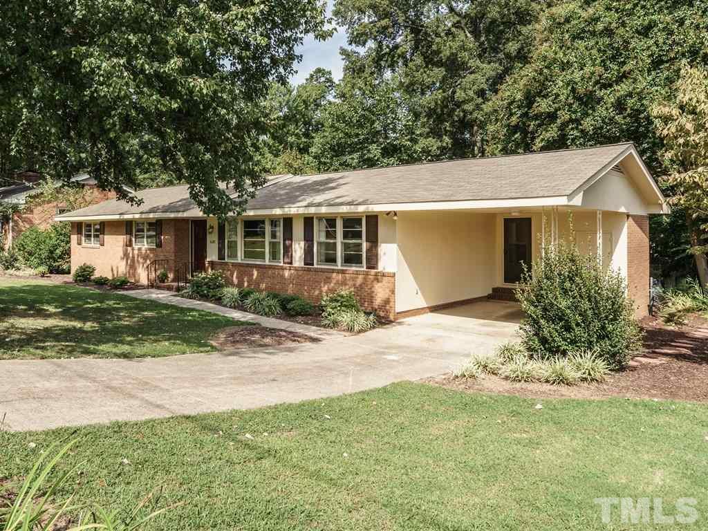 4305 Rowan Street Raleigh, NC 27609 - Photo 22 of 22 front view of house with a yard