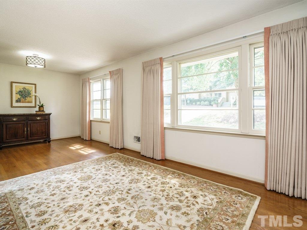 4305 Rowan Street Raleigh, NC 27609 - Photo 5 of 22 a view of a room with window and hardwood floor
