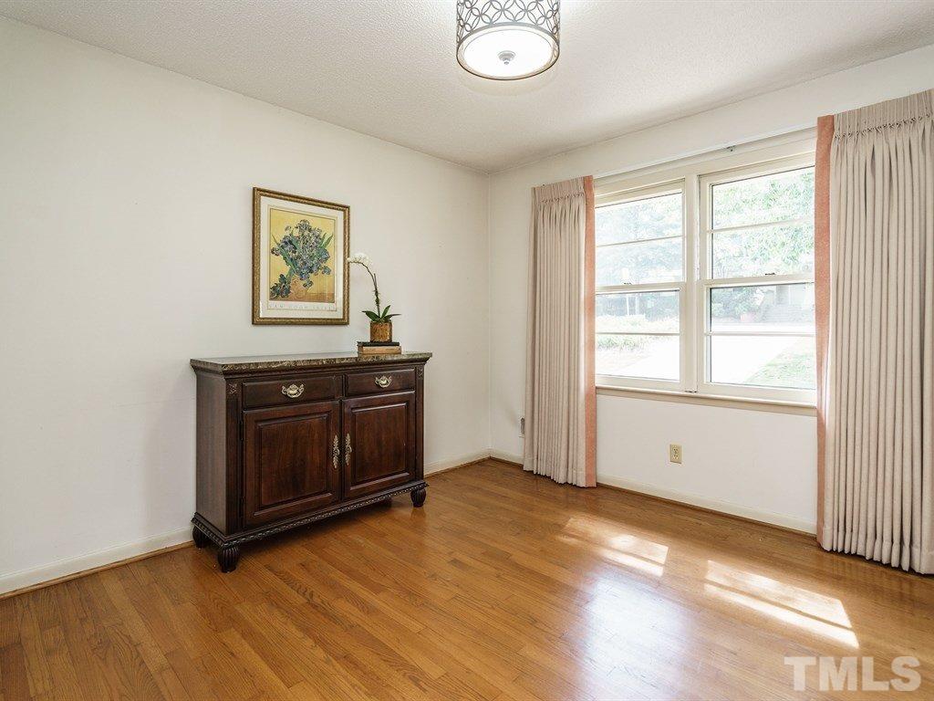 4305 Rowan Street Raleigh, NC 27609 - Photo 7 of 22 wooden floor and window in a room