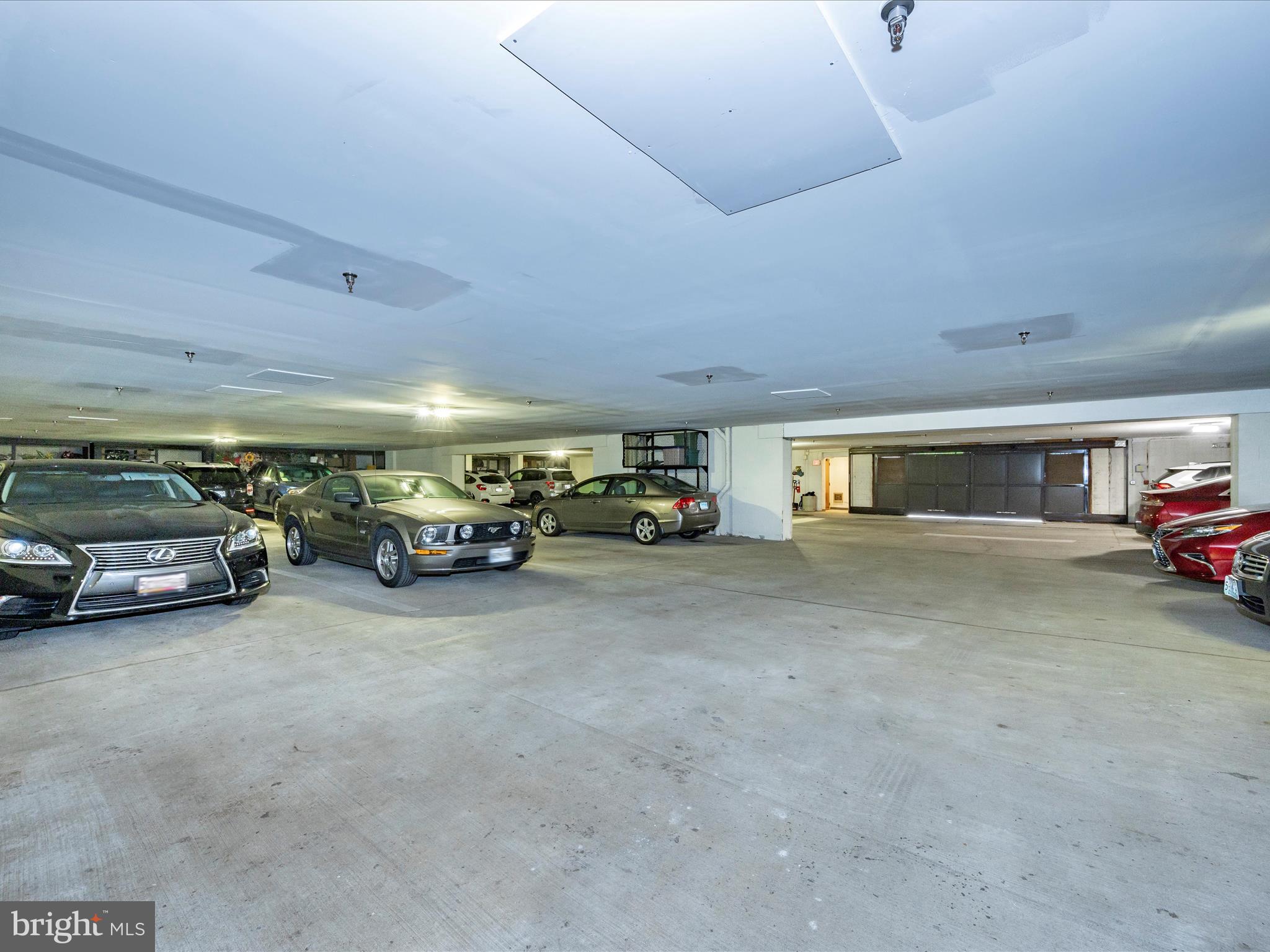 102 Mercer Court, Unit 22 1A Frederick, MD 21701 - Photo 46 of 56 a view of parking space with parked cars