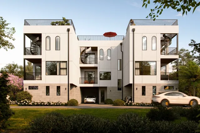 a view of multiple house with a yard