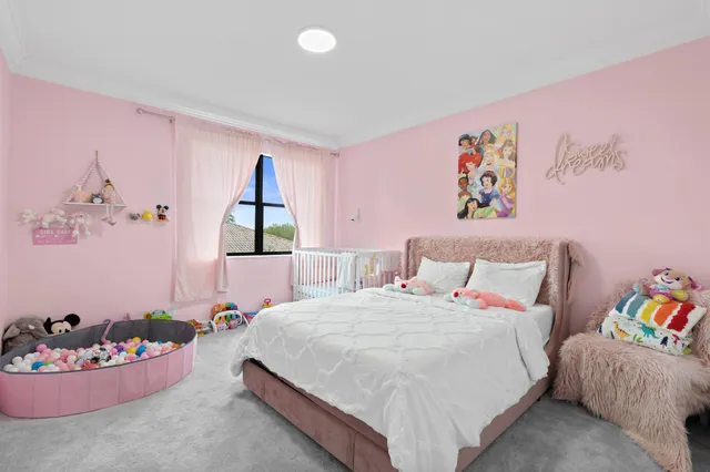 a bed room with a bed and a couch