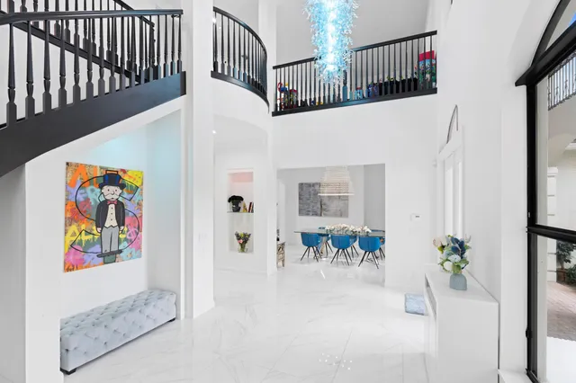 a view of entryway with furniture and livingroom