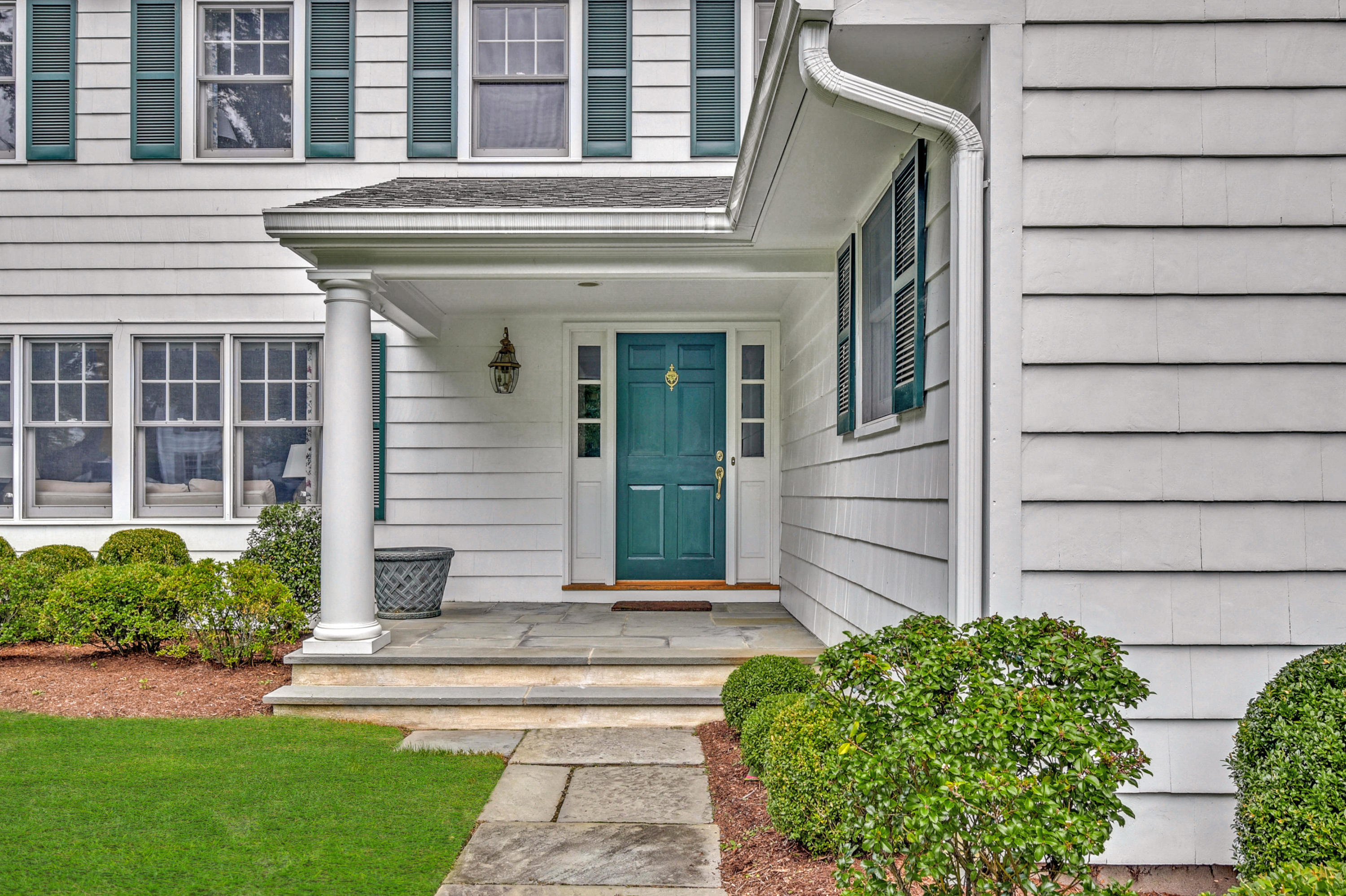 11 Sunset Road Darien, CT 06820 - Photo 2 of 38 a front view of a house with garden