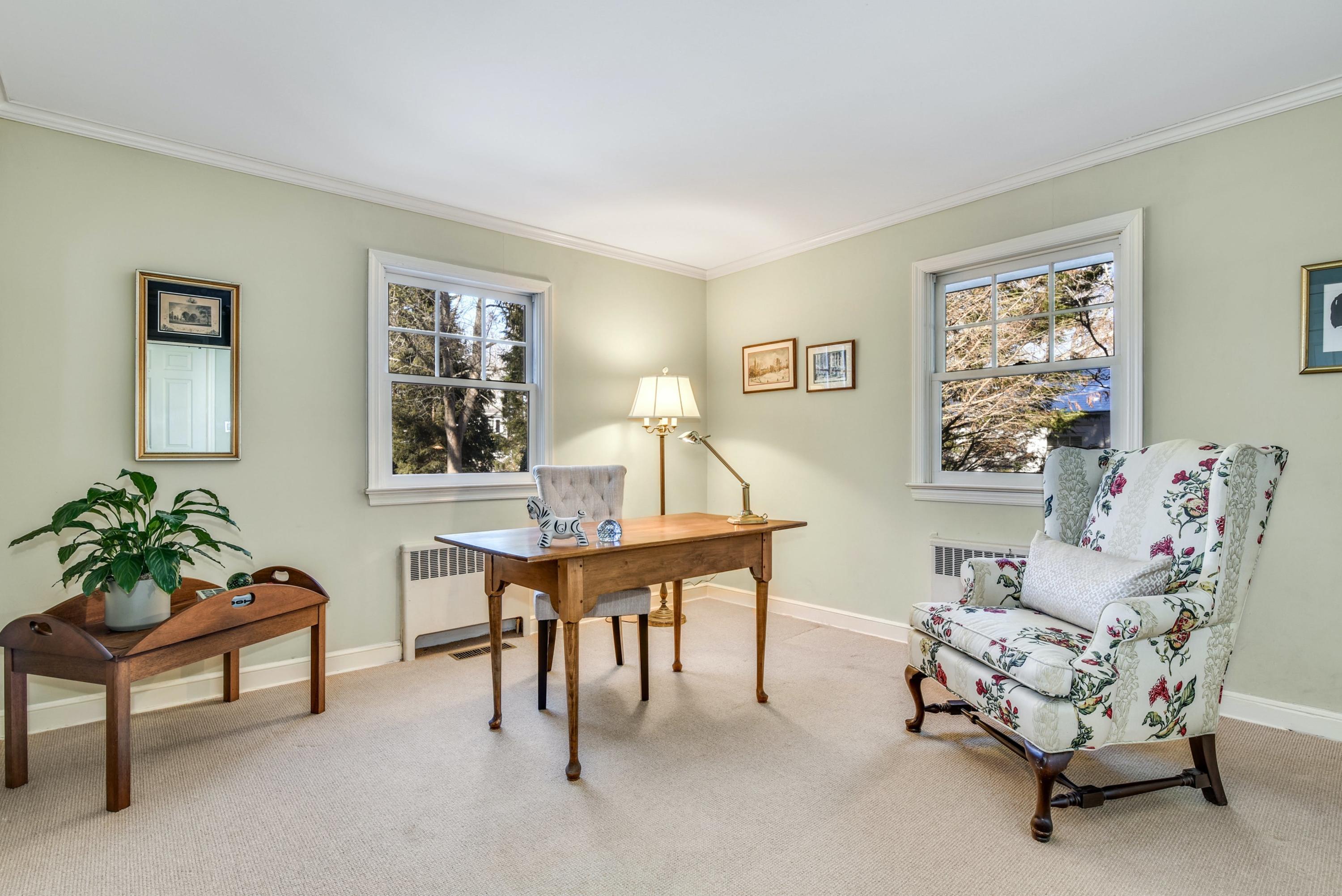 11 Sunset Road Darien, CT 06820 - Photo 11 of 38 a living room with furniture and a potted plant