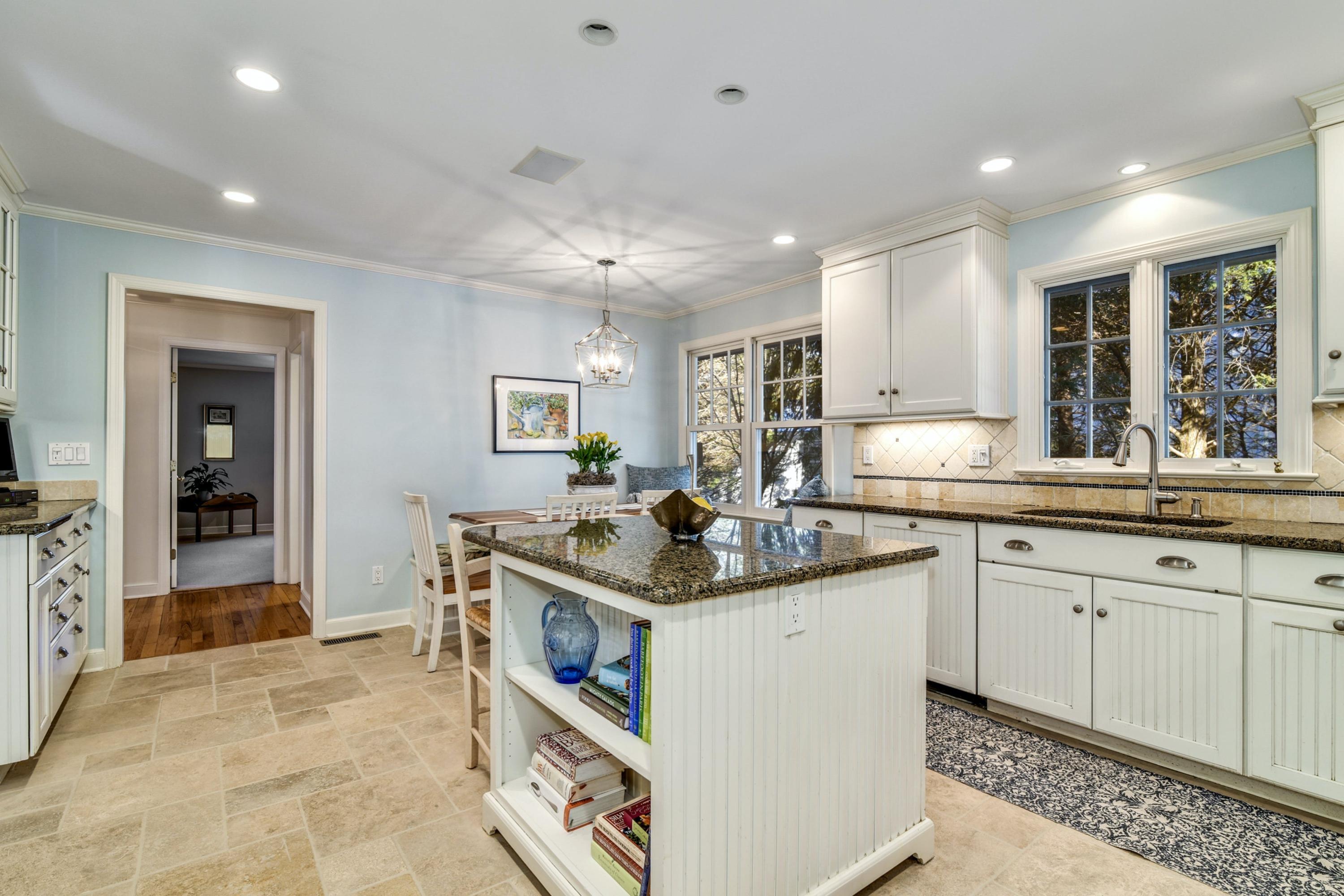 11 Sunset Road Darien, CT 06820 - Photo 15 of 38 a kitchen with stainless steel appliances granite countertop a sink and cabinets