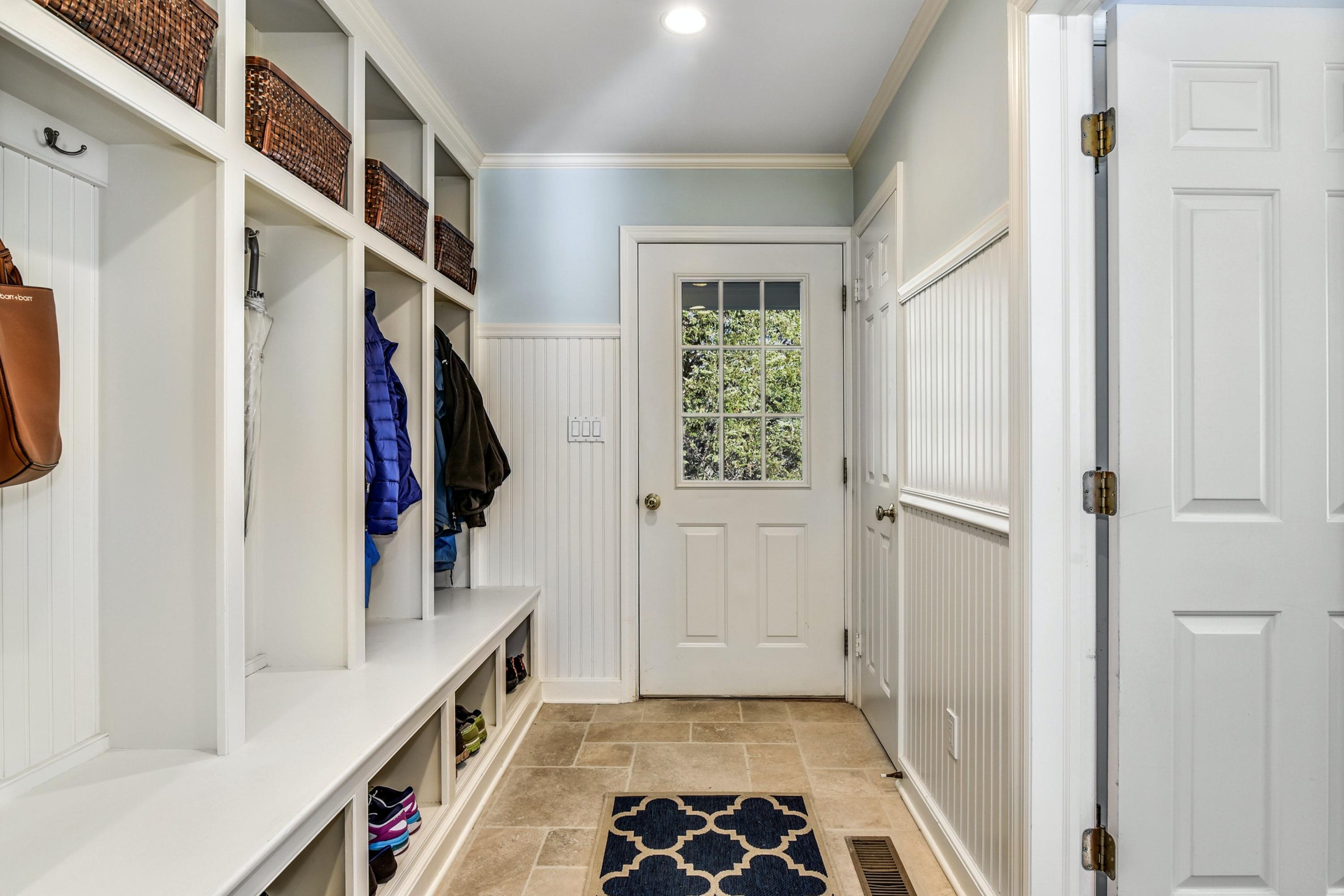 11 Sunset Road Darien, CT 06820 - Photo 18 of 38 a view of walk in closet with clothes and shoes