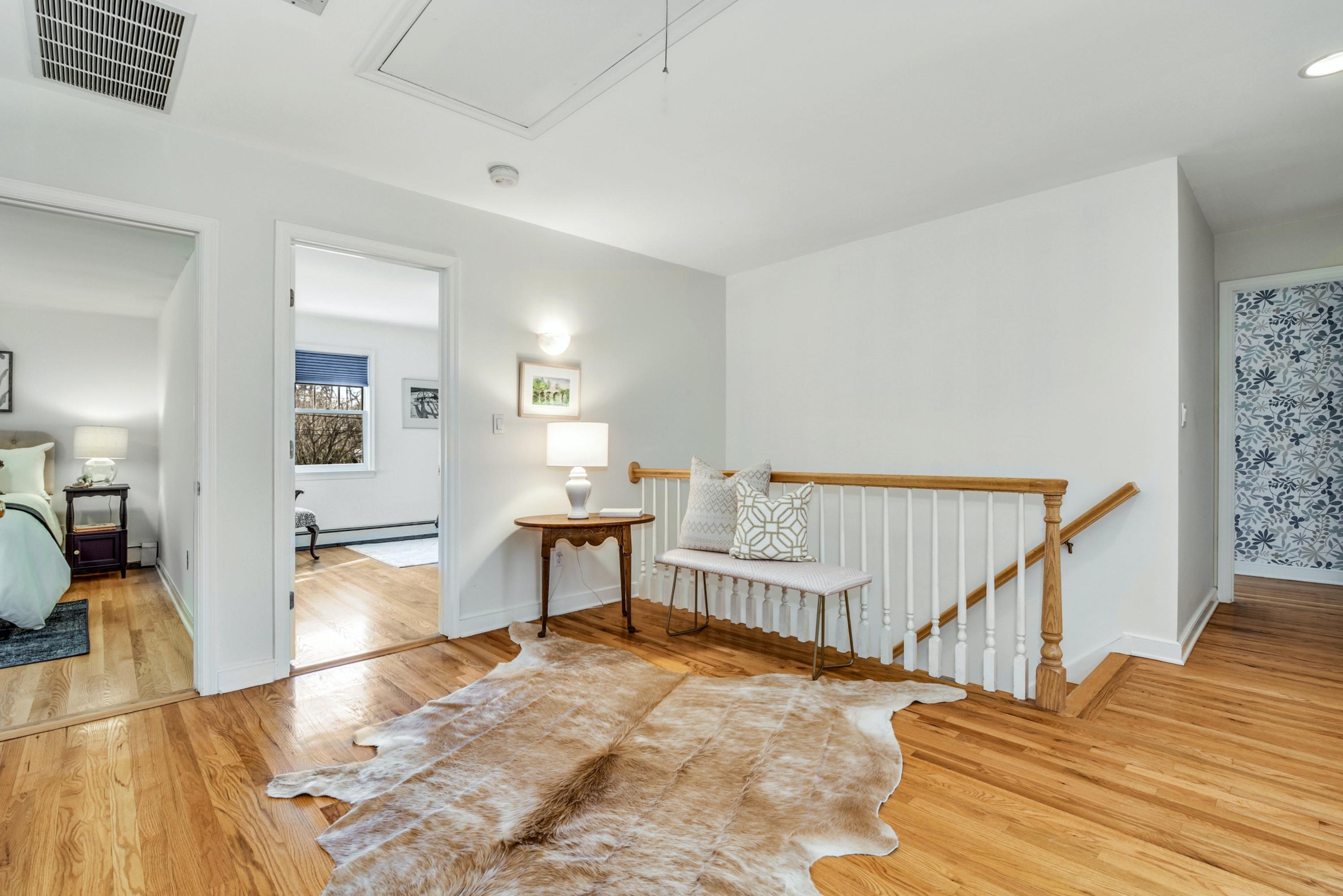 11 Sunset Road Darien, CT 06820 - Photo 21 of 38 a view of a livingroom with furniture wooden floor and bedroom view