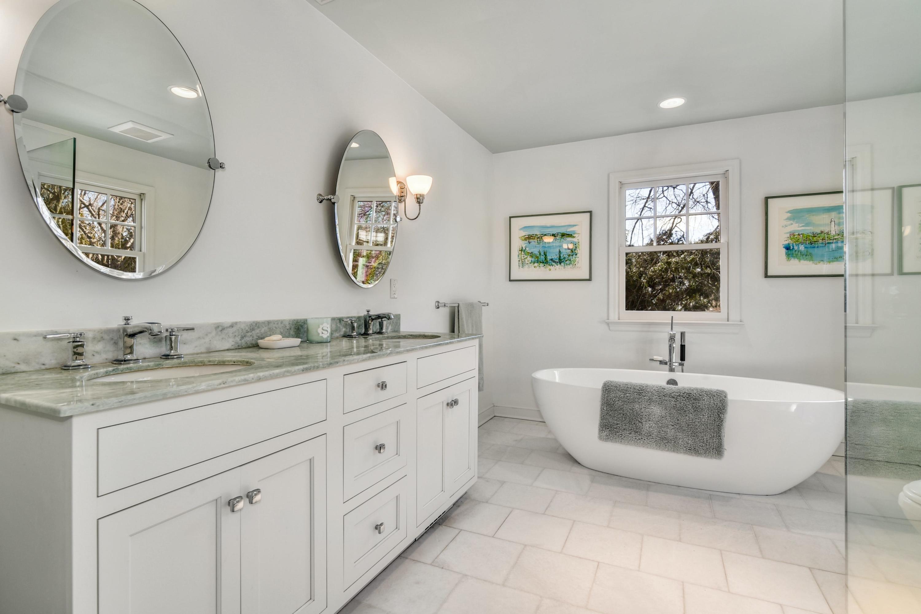 11 Sunset Road Darien, CT 06820 - Photo 24 of 38 a bathroom with a granite countertop sink and a mirror