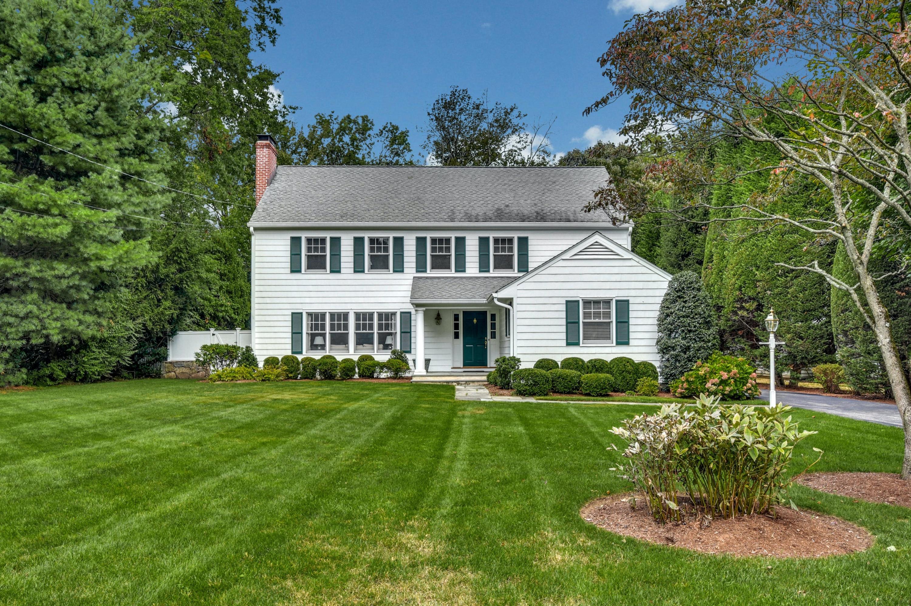 11 Sunset Road Darien, CT 06820 - Photo 35 of 38 a front view of a house with a garden