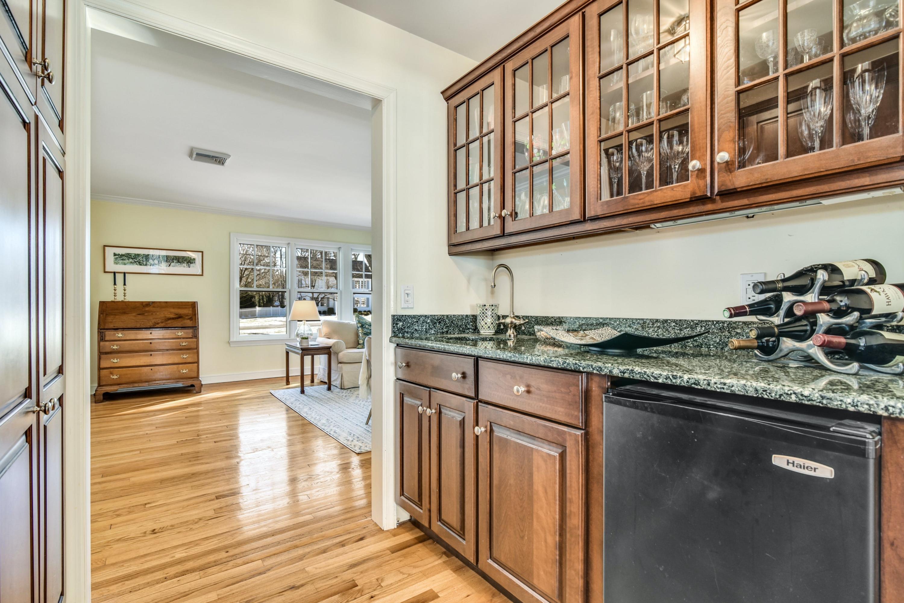 11 Sunset Road Darien, CT 06820 - Photo 10 of 38 a kitchen with stainless steel appliances granite countertop a stove and cabinets