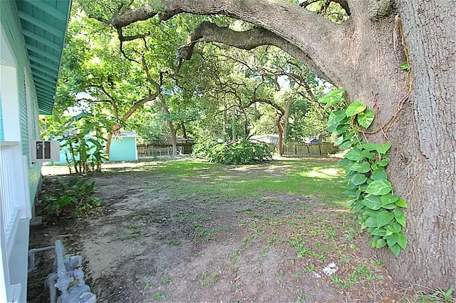 a view of outdoor space with deck and yard