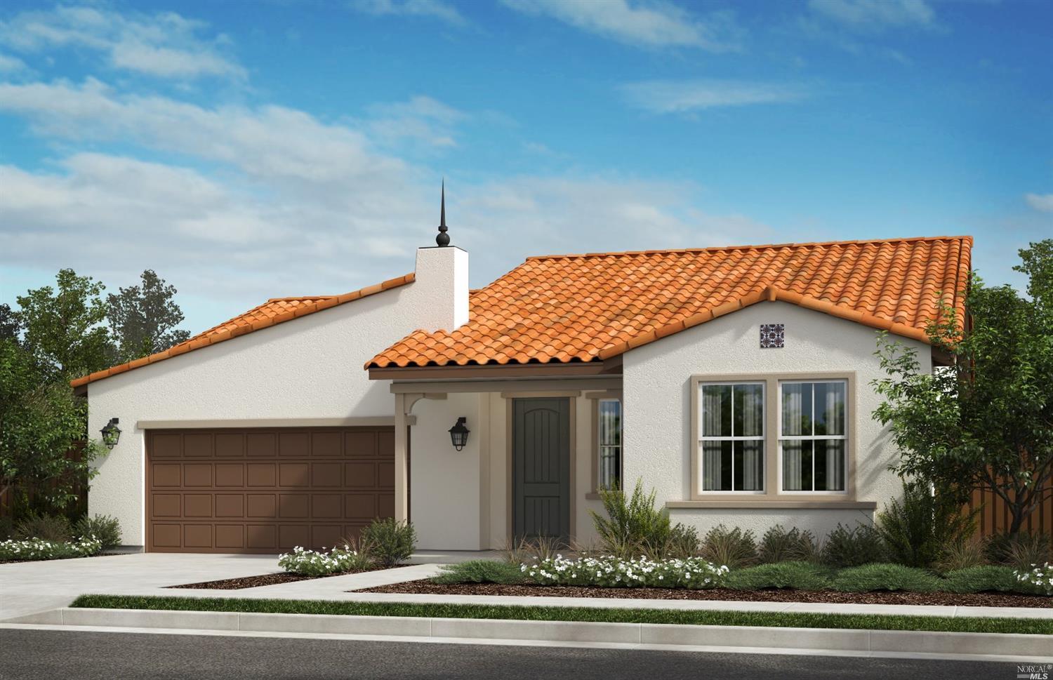 a front view of a house with a garage