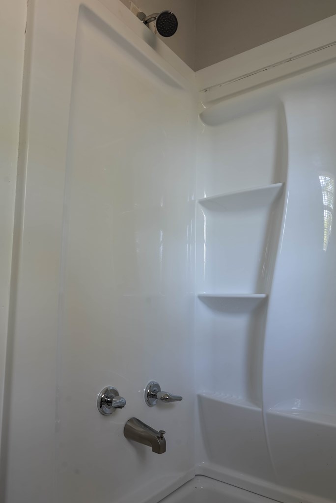 3221 Walker Street Columbus, GA 31903 - Photo 15 of 18 a bathroom with a shower