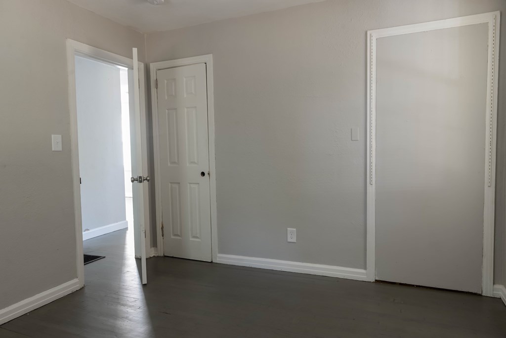 3221 Walker Street Columbus, GA 31903 - Photo 8 of 18 a view of an empty room with wooden floor