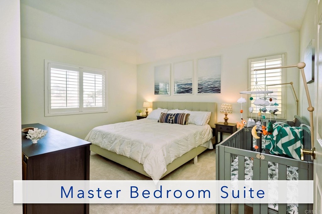 821 Windcrest Drive Carlsbad, CA 92011 - Photo 25 of 53 a bedroom with bed and window