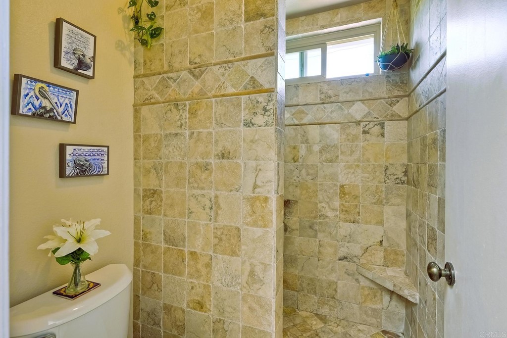 821 Windcrest Drive Carlsbad, CA 92011 - Photo 28 of 53 a bathroom with a shower