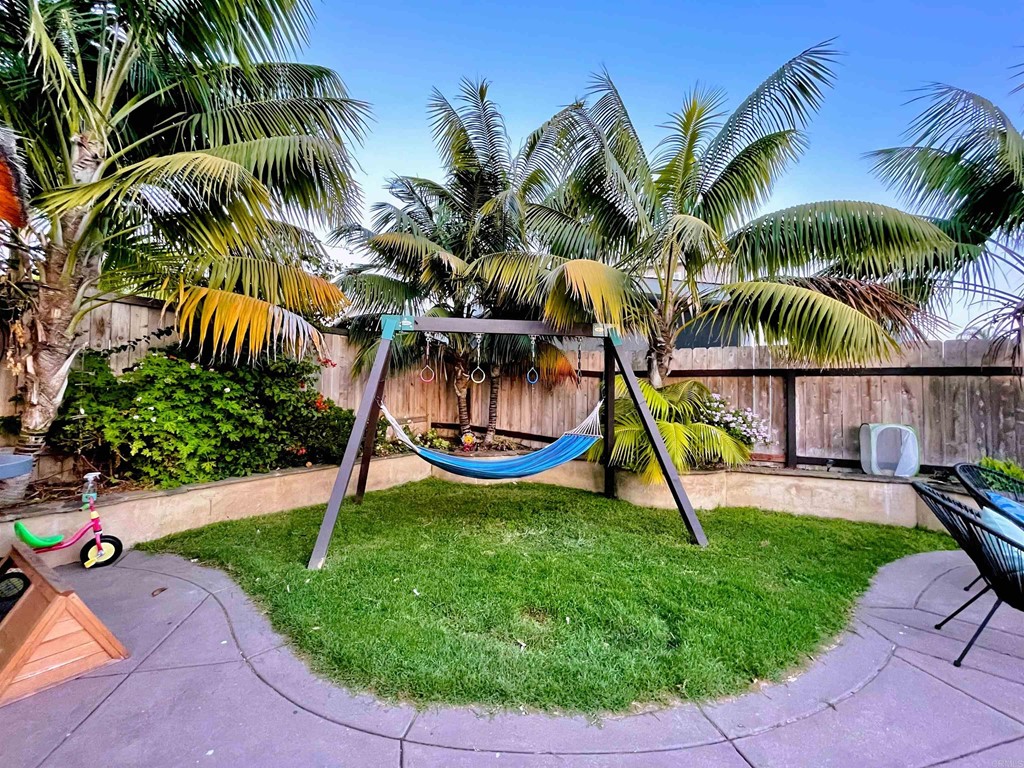 821 Windcrest Drive Carlsbad, CA 92011 - Photo 44 of 53 a view of a backyard with palm trees