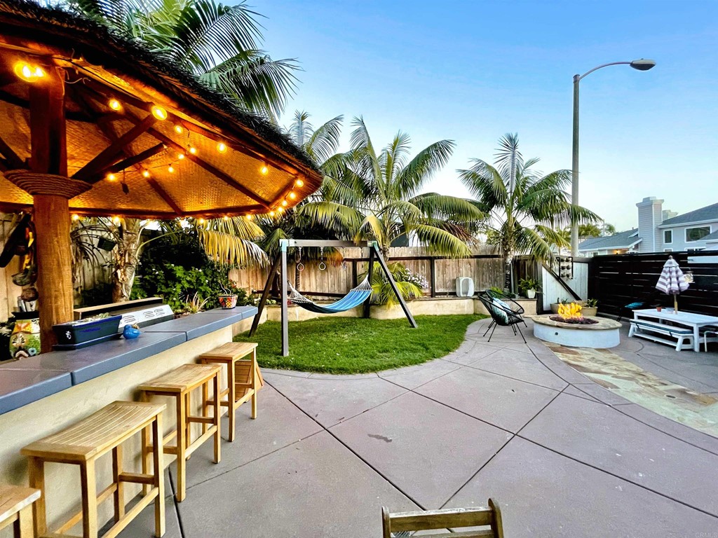 821 Windcrest Drive Carlsbad, CA 92011 - Photo 49 of 53 a view of a backyard with sitting area